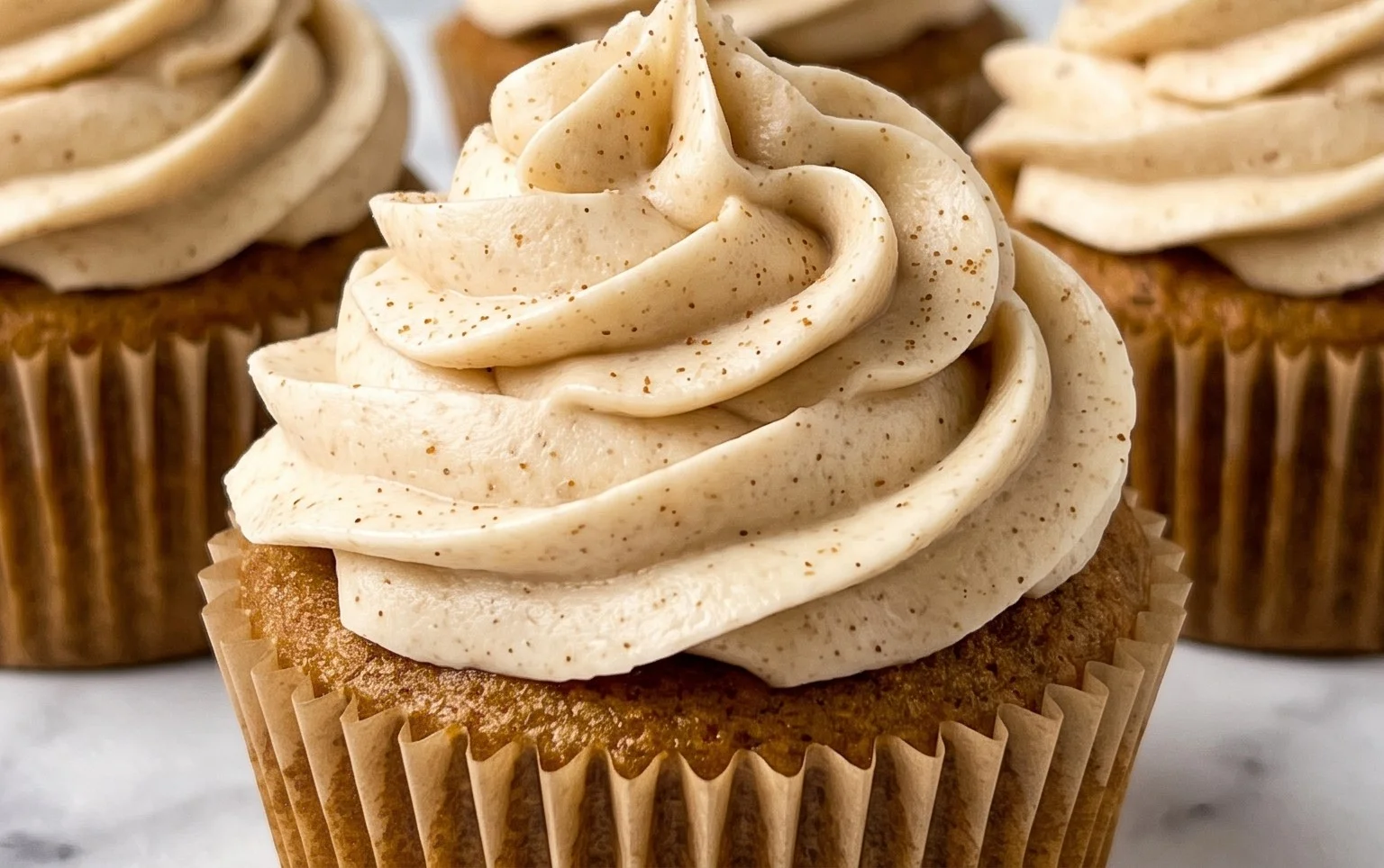 Vanilla Chai Pumpkin Latte Cupcakes with Cinnamon Brown Sugar Frosting